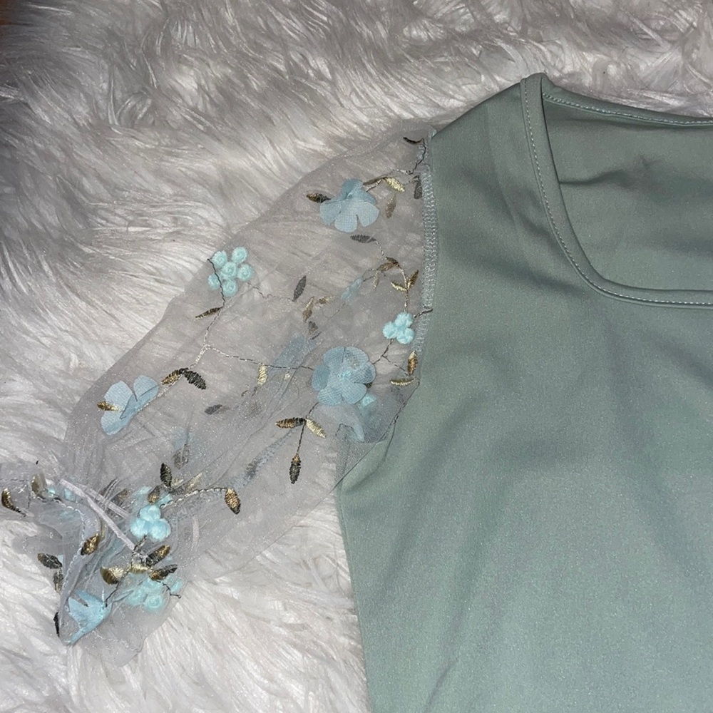 Beautiful mint green bodysuit